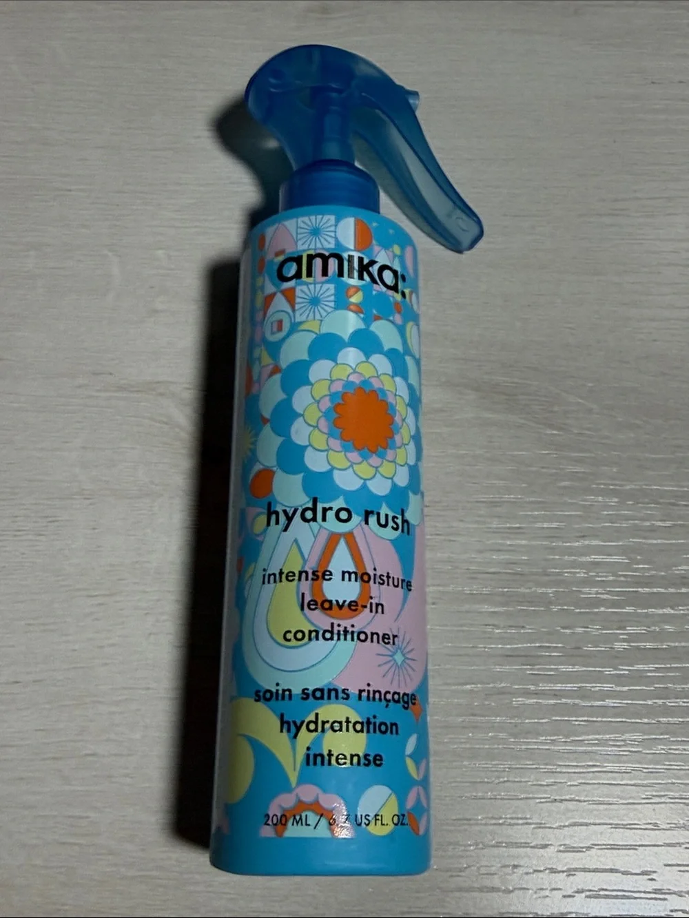 amika Hydro Rush Leave-In Conditioner – Blue, Orange, Yellow